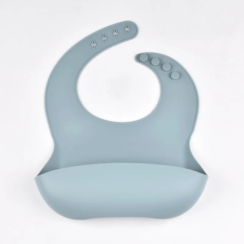 Baby feeding bib designed to prevent food stains and mess