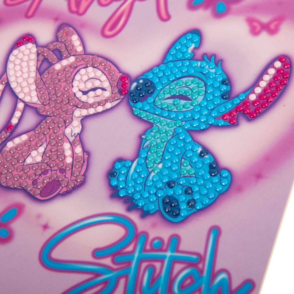 Creative crafting fun with Stitch canvas, crystals, and accessories