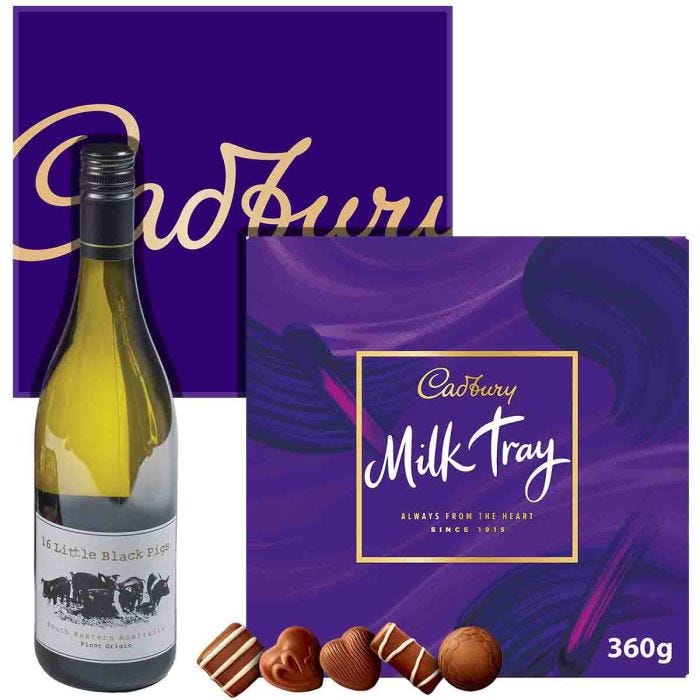 Elegant white wine paired with Cadbury Milk Tray box