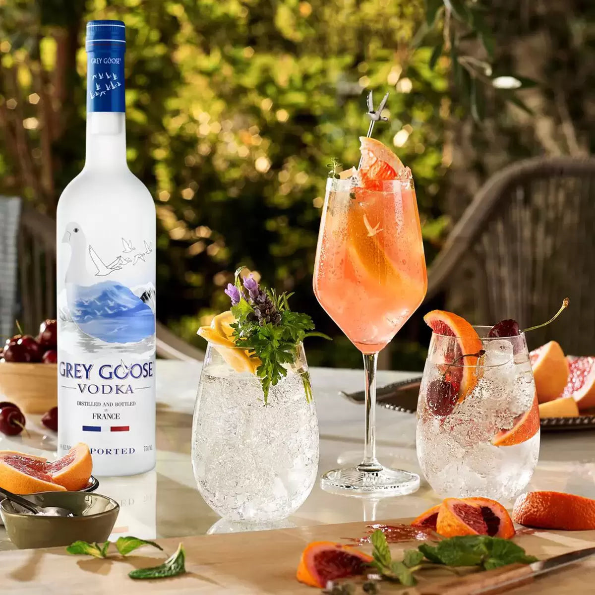 Grey Goose Vodka used in a high-end cocktail, perfect for celebrations