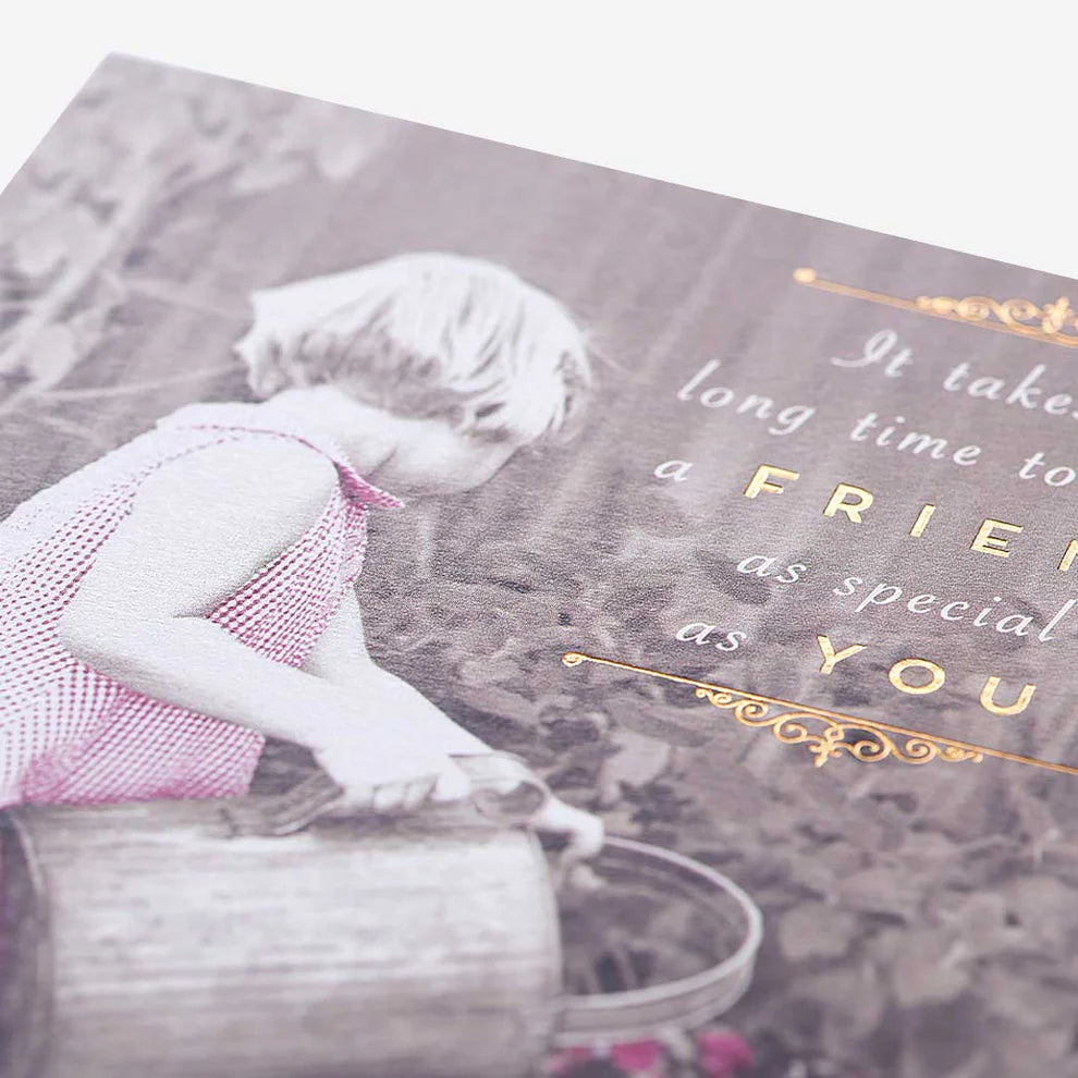 Blank inside friendship card with girl watering flowers design, ideal for personalized messages and celebrating meaningful friendships