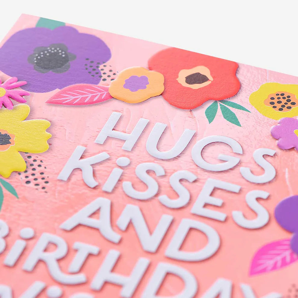 Hugs & Kisses Floral Birthday Card, a charming option among birthday cards and birthday card greeting cards, perfect for sending love on special days.