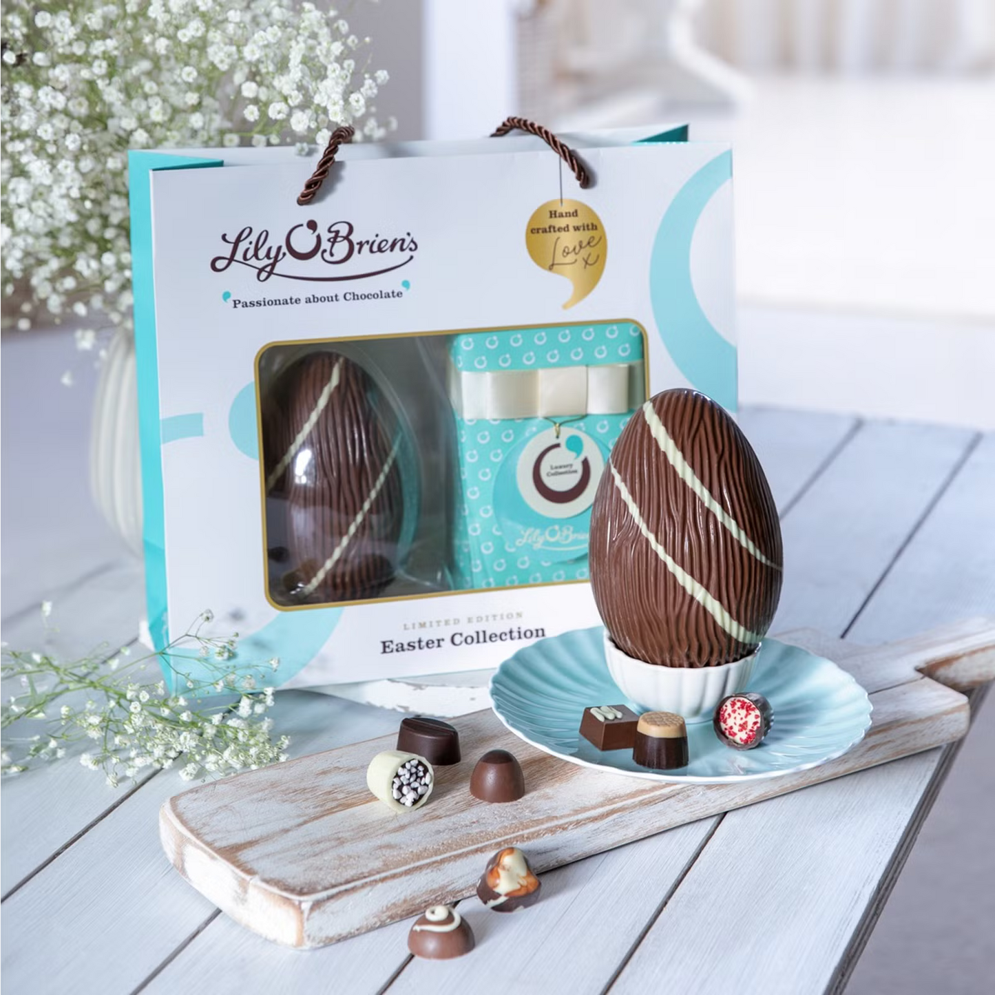Milk chocolate egg with honeycomb crispy hearts in Easter bag