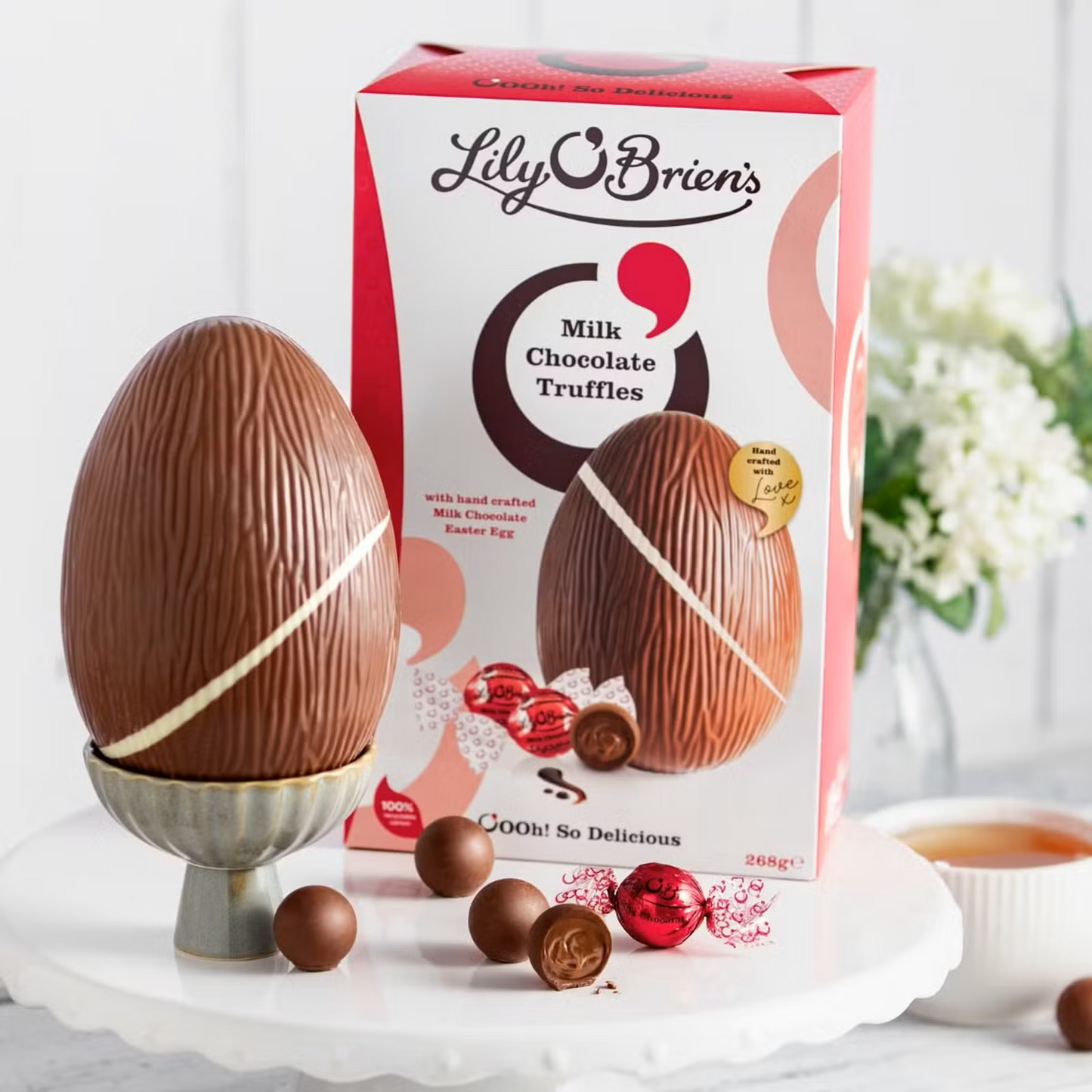Luxury milk chocolate Easter egg with velvety milk truffles