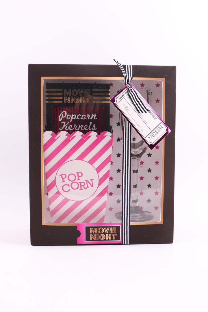 Movie night gift box filled with tasty snacks and treats for a fun night in