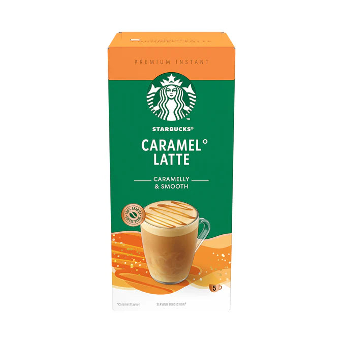 Starbucks Caramel Latte Instant Coffee Sachets laid out next to a steaming mug, ready to prepare