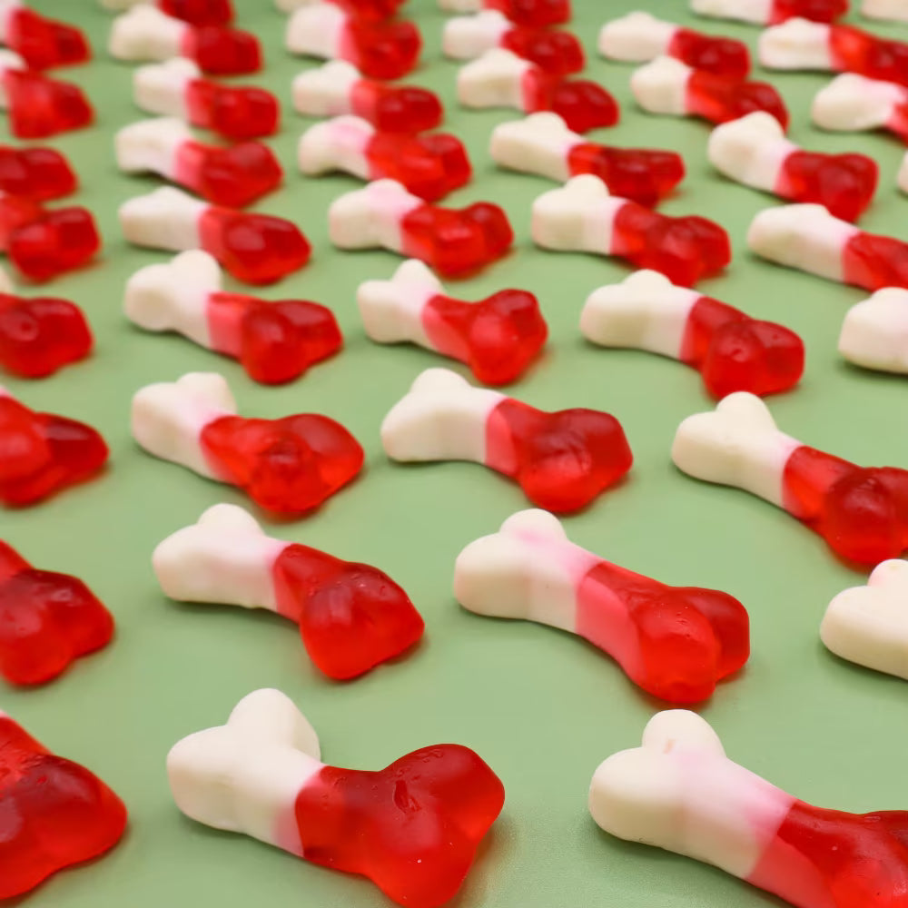 Strawberry-flavoured gummy bone sweets for parties and pick-and-mix