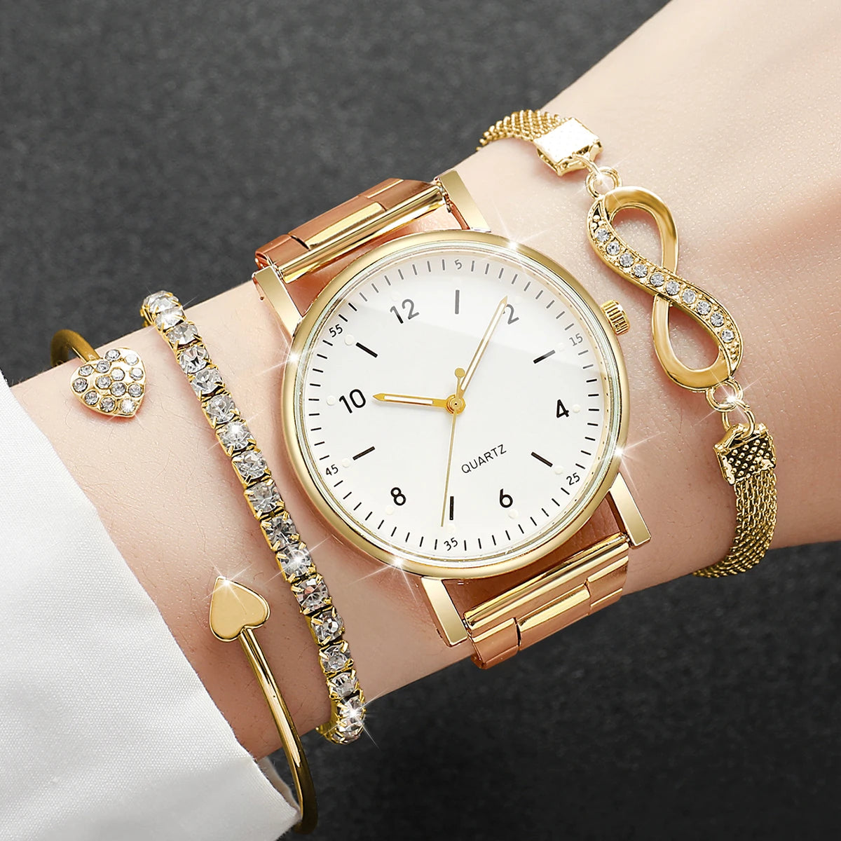 Women's fashion watch with three matching bracelets