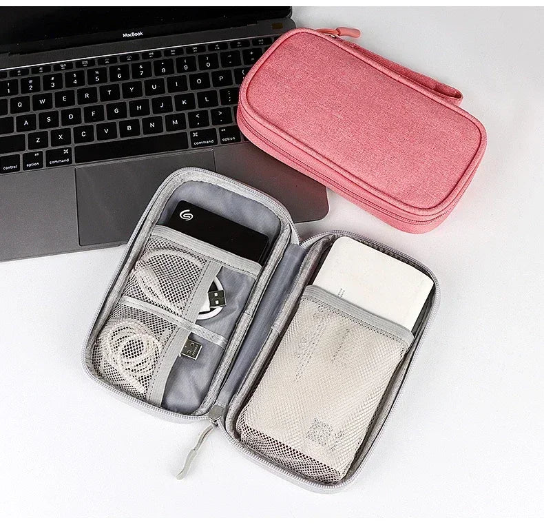 Multi-layer tech organiser for separated cable storage