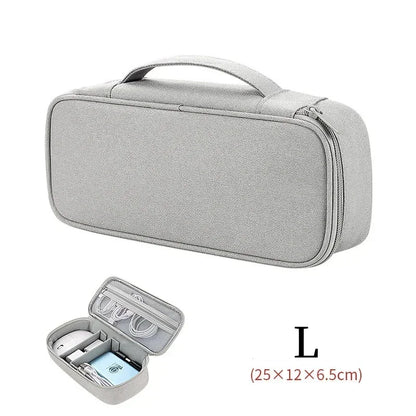 Small grey travel organiser for electronic accessories
