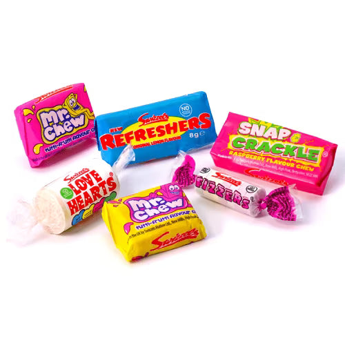Colourful assorted Swizzels sweets including Fizzers, Love Hearts, and Refreshers