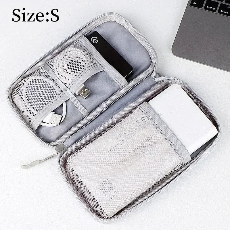 Black cable organiser bag for chargers and travel accessories