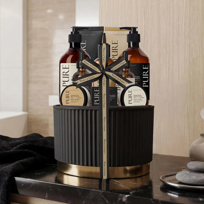 Black ribbed resin pot with luxury body care products