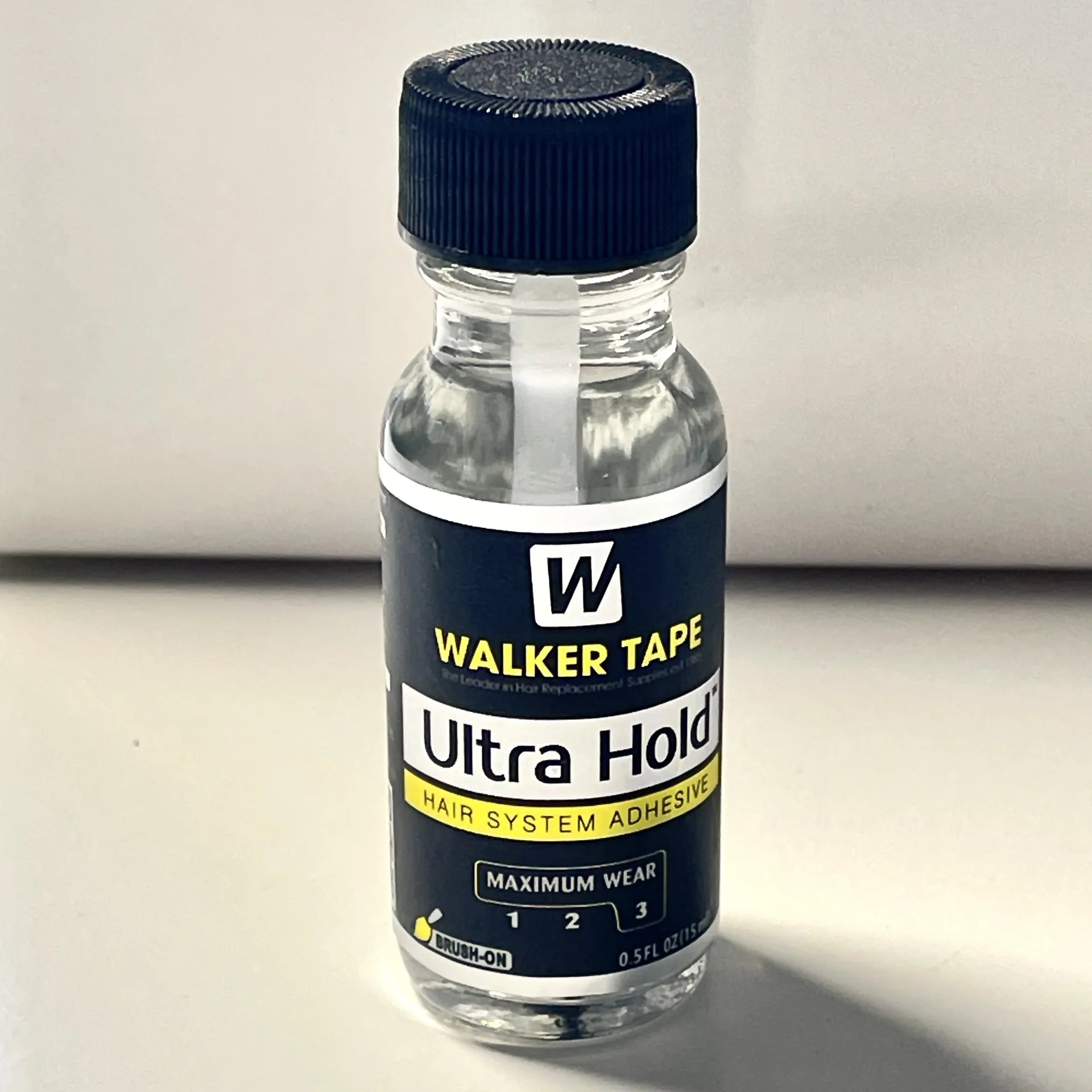 Strong hold wig adhesive for long lasting wear