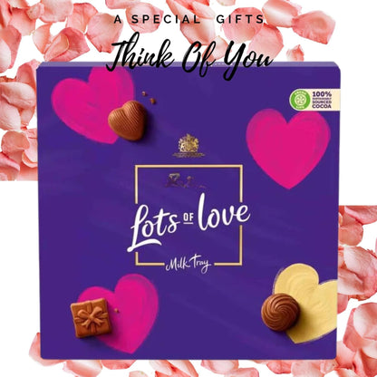 Assorted milk chocolates arranged in a premium presentation box