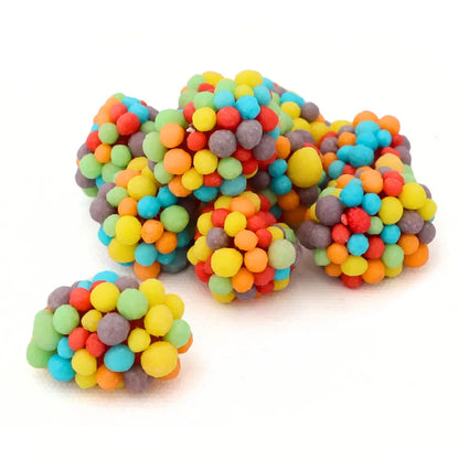 Colourful chewy fruit sweets with crunchy coating