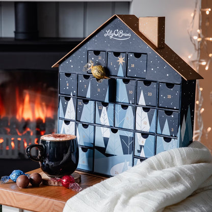 Delicious holiday chocolate countdown box with assorted gourmet truffles, perfect for gifting