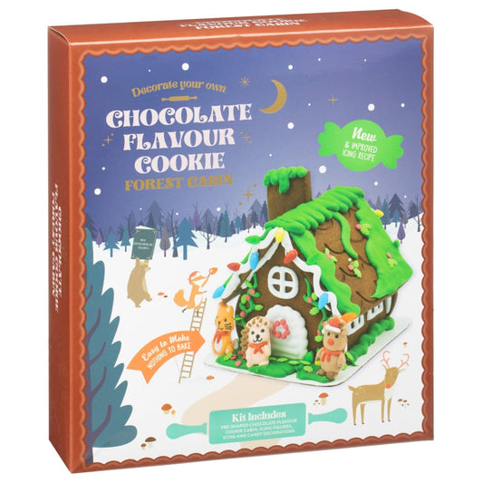 Christmas chocolate cookie cabin with icing and candy decorations