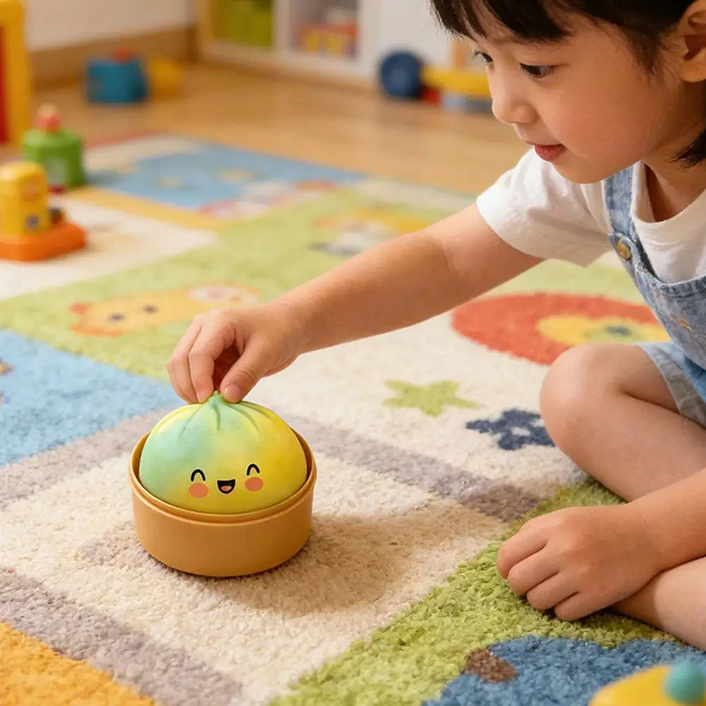 Golden dumpling bun toy shimmer effect steamer cage stress ball