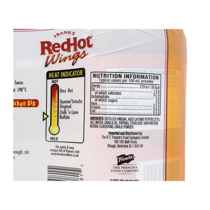 Chicken wings coated with Frank's RedHot Wings Buffalo Sauce, showcasing its vibrant color