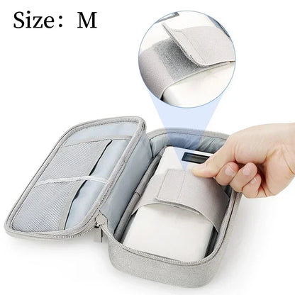 Grey electronics organiser for cables, power banks and USB drives