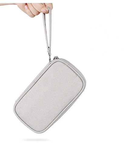 Grey portable tech storage pouch for travel accessories