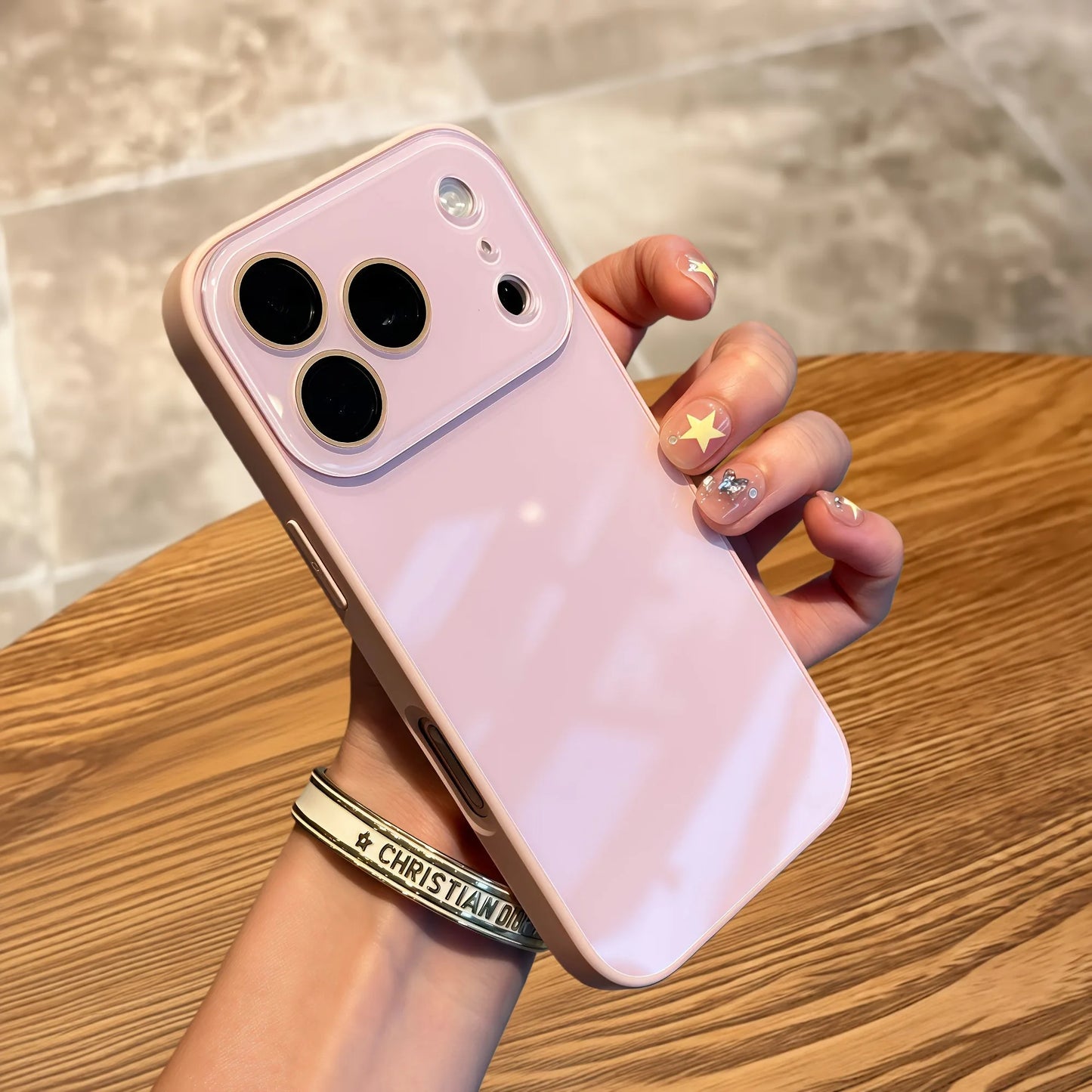 Glass iPhone case lifestyle model holding phone candy colour