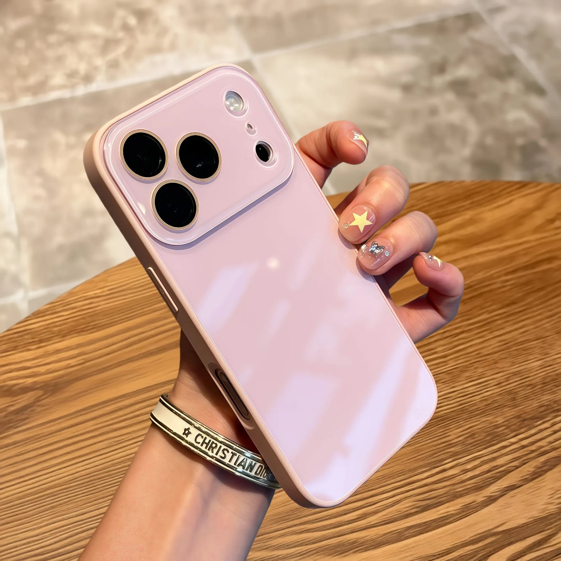 Glass iPhone case lifestyle model holding phone candy colour