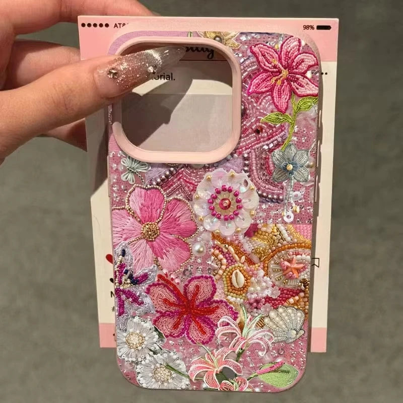 Beaded artistic iPhone case with floral and ocean design