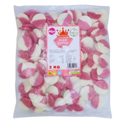 A 2 kg clear plastic bag filled with pink and white foam smiley candies, with a white and pink Kingway brand label on the front.