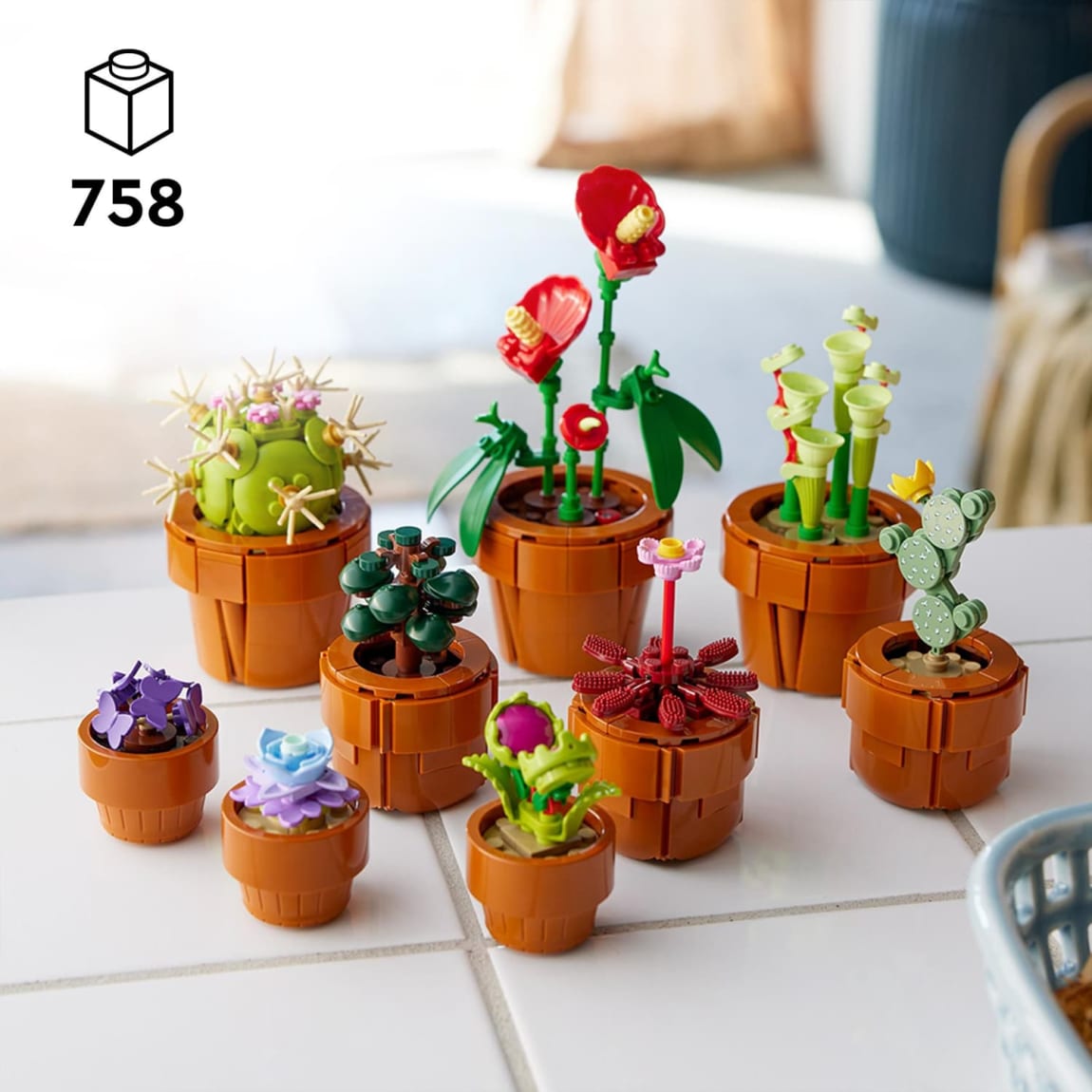Nine artificial LEGO plants in terracotta pots