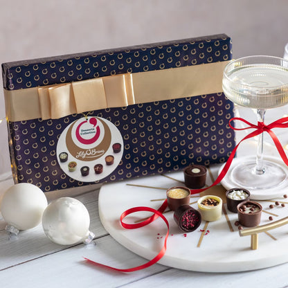 Handcrafted chocolates inspired by iconic dessert recipes in an elegant Lily O’Brien box