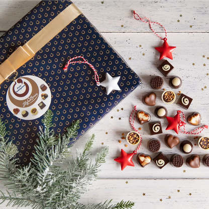 Assorted milk, dark, and white miniature chocolates from Lily O’Brien’s in a gift-ready box