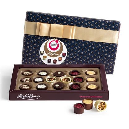 Assorted milk, dark, and white chocolates featuring Lemon Posset, Crème Brûlée, and Raspberry Infusion