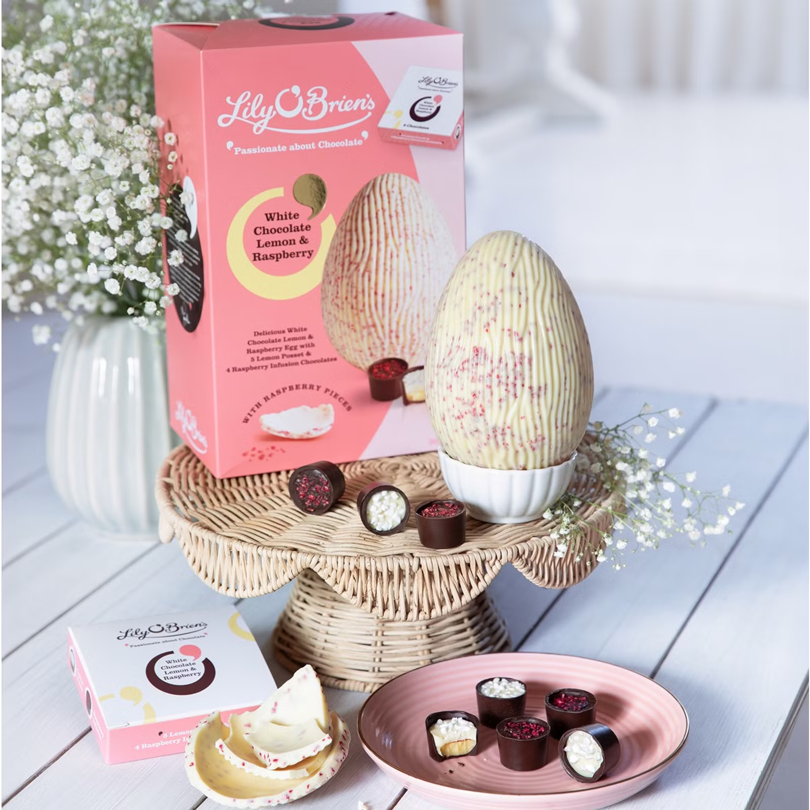 White chocolate Easter egg with lemon posset and raspberry infusion chocolates