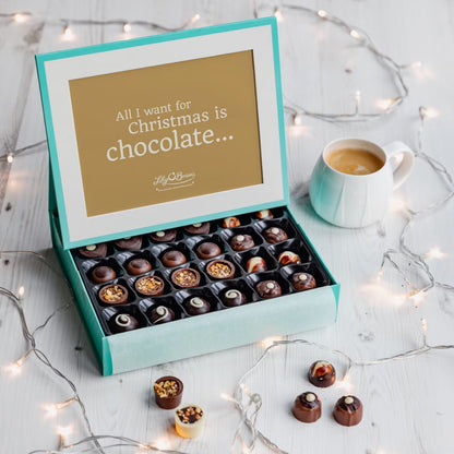 Lily O’Brien’s gourmet milk, dark, and white chocolates in a luxurious Christmas gift box
