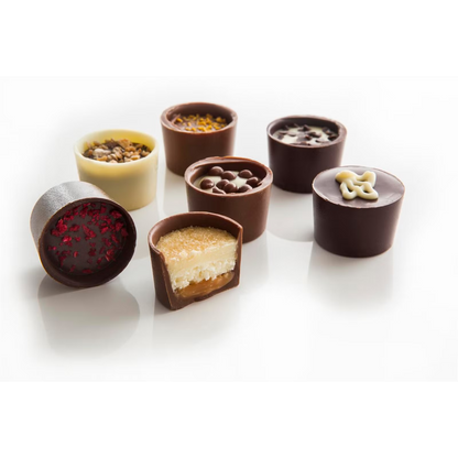 Gourmet milk, dark, and white chocolates featuring flavors like Lemon Posset and Crème Brûlée