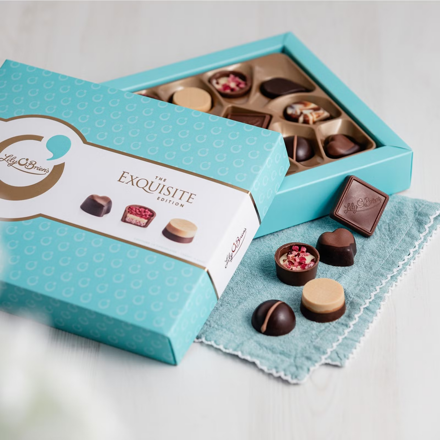 Gourmet chocolates including Caramel Crunch, Almond & Cranberry, and Dulce de Leche