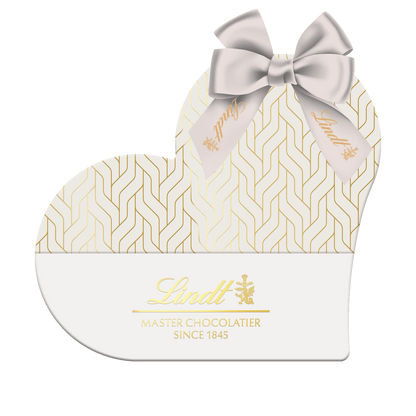 Lindt white heart-shaped box filled with Lindor chocolates