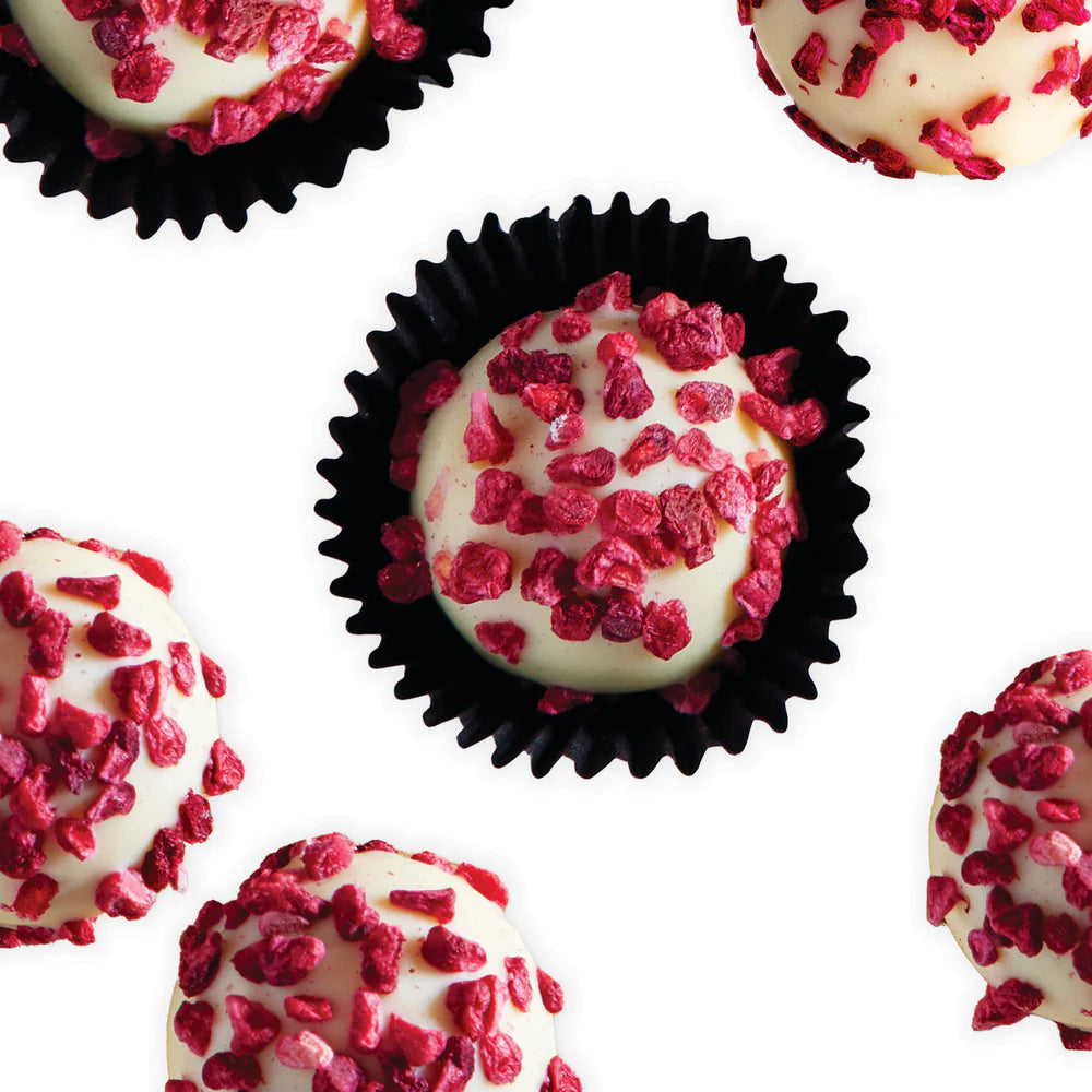 77 handmade white chocolate truffles with raspberry ganache
