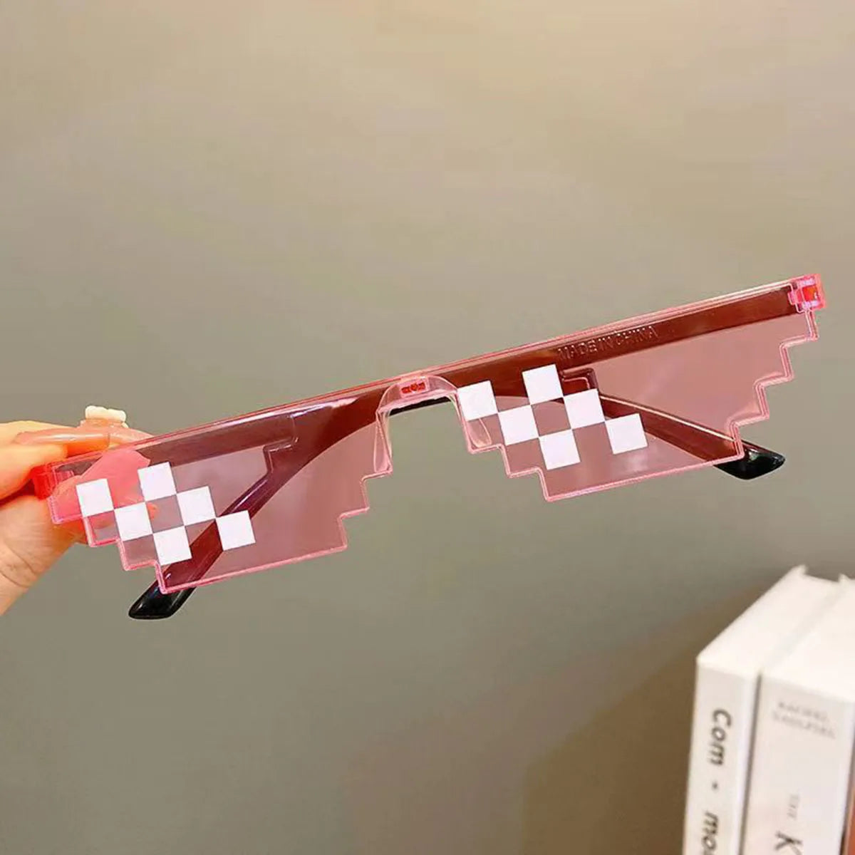 Novelty party sunglasses with pixel design