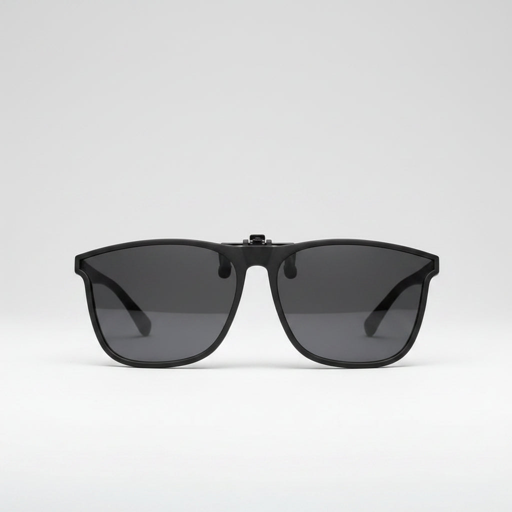 Polarized sunglasses clip attached to prescription glasses
