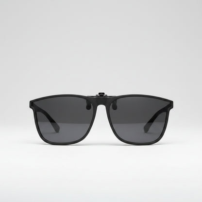 Polarized sunglasses clip attached to prescription glasses