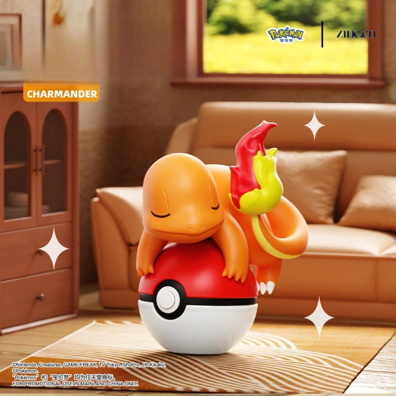 Pokémon Charmander figurine in a living room setting with a couch and cabinet.