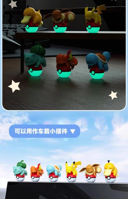 Set of small character figurines with glowing green bases on a dark surface.