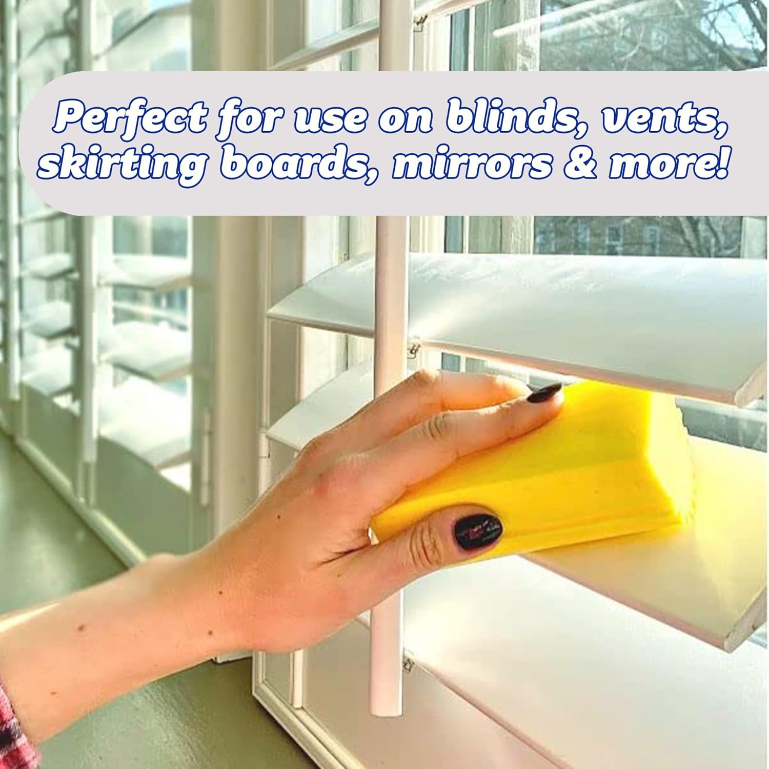 Damp Duster Scrub Daddy removing dust from venetian blinds – reusable sponge traps dirt easily