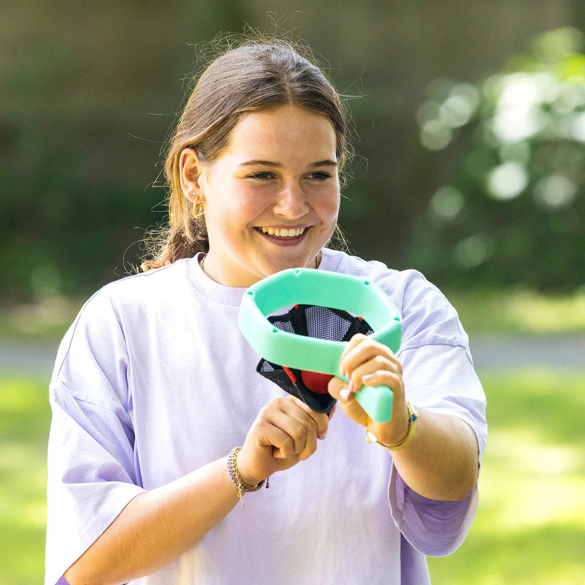 Outdoor competitive target aiming game with soft balls