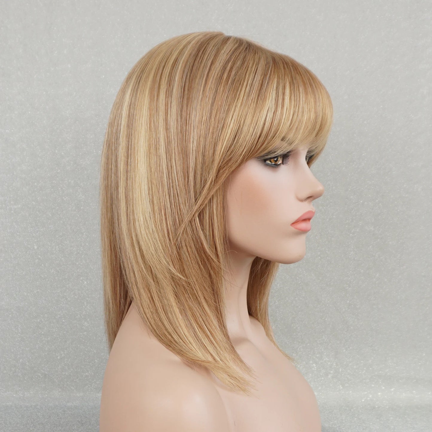 Customisable medium blonde wig with soft wispy bangs
