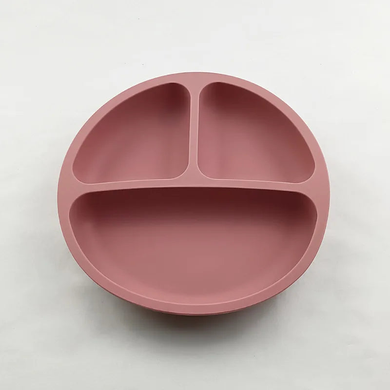 Suction base toddler bowl designed to reduce spills