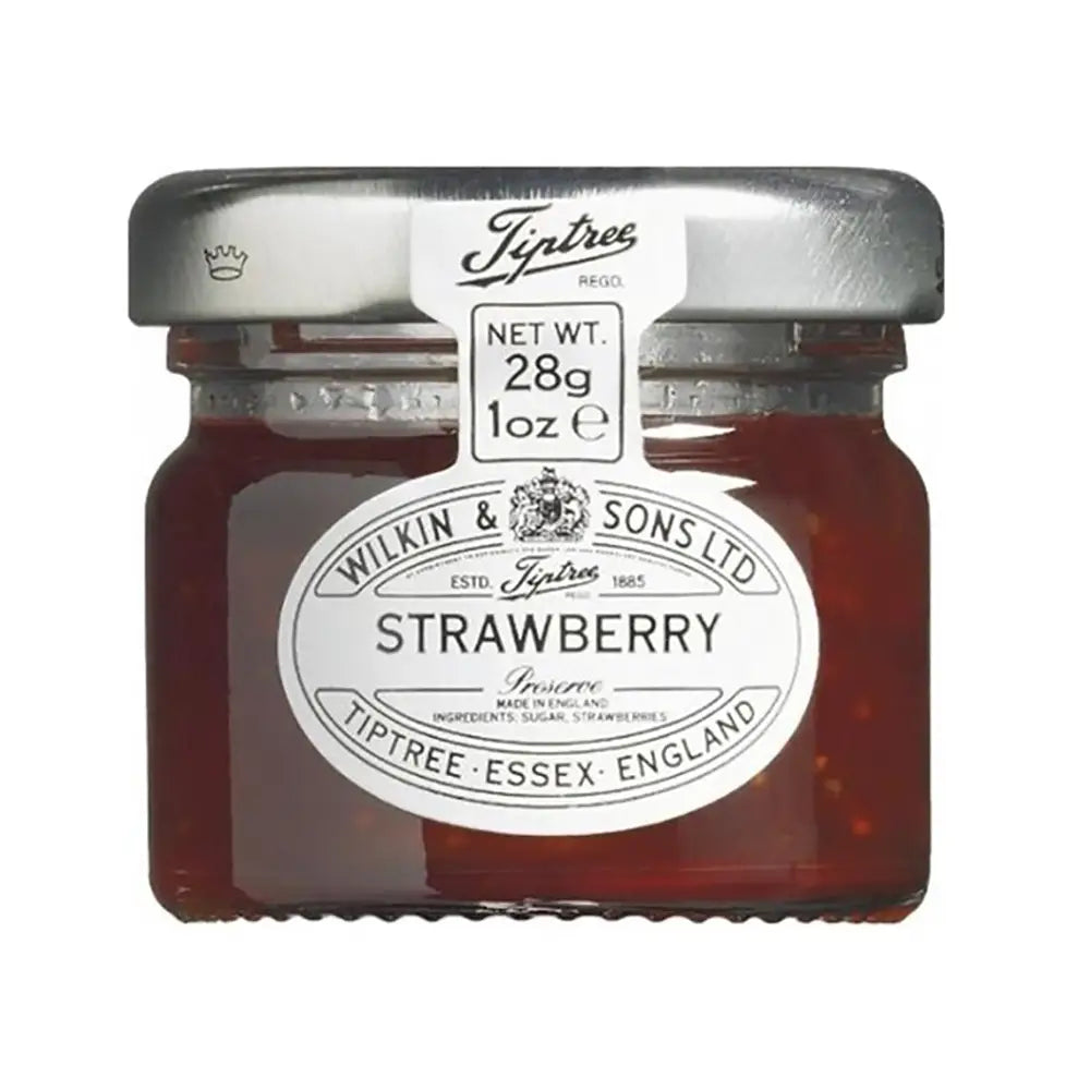 Fresh strawberry preserve in individual mini glass jars